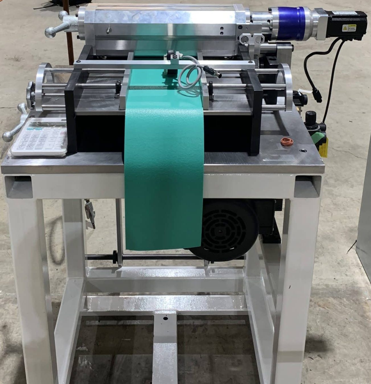 New TapeCutting Assembly Allows for QuickChange Adjustments Minland